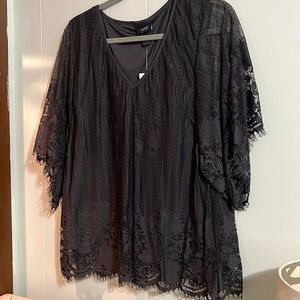 Dark gray v neck. Soft top, sheer sleeves